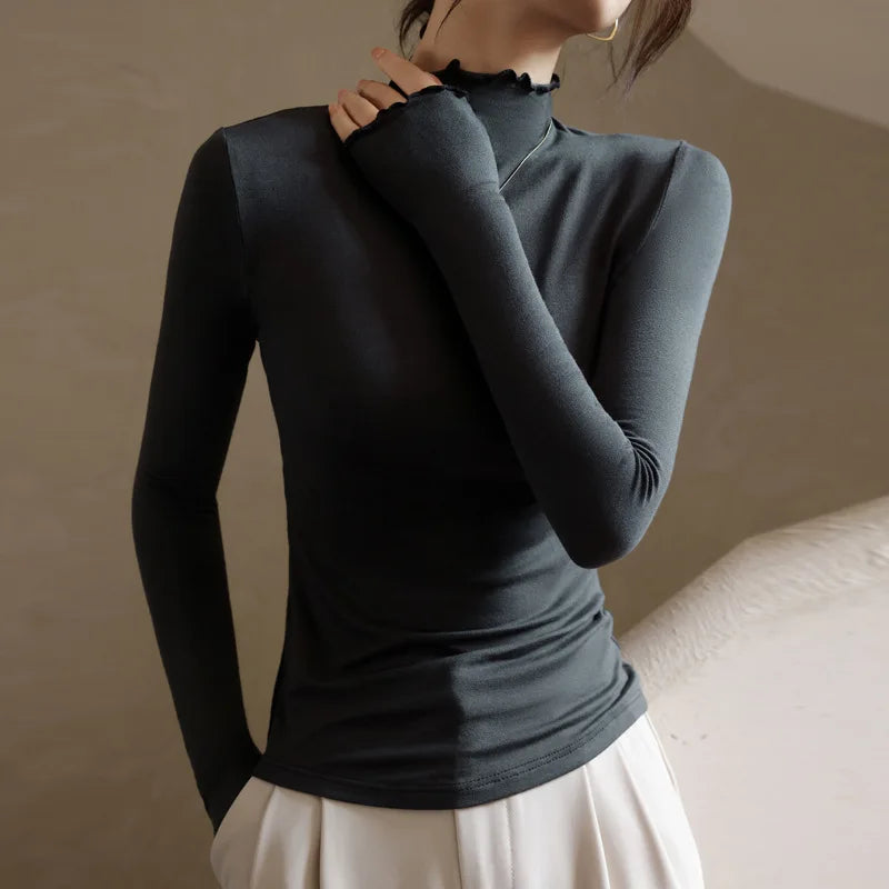 Softline Ruffle Turtleneck