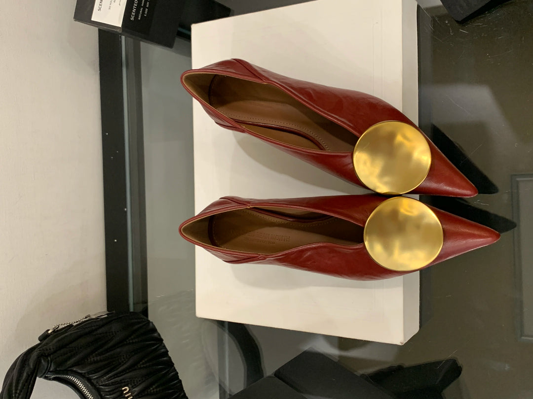 Icon Disc Point Pumps