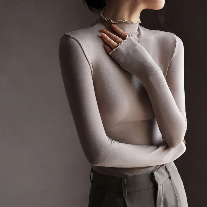 Softline Ruffle Turtleneck