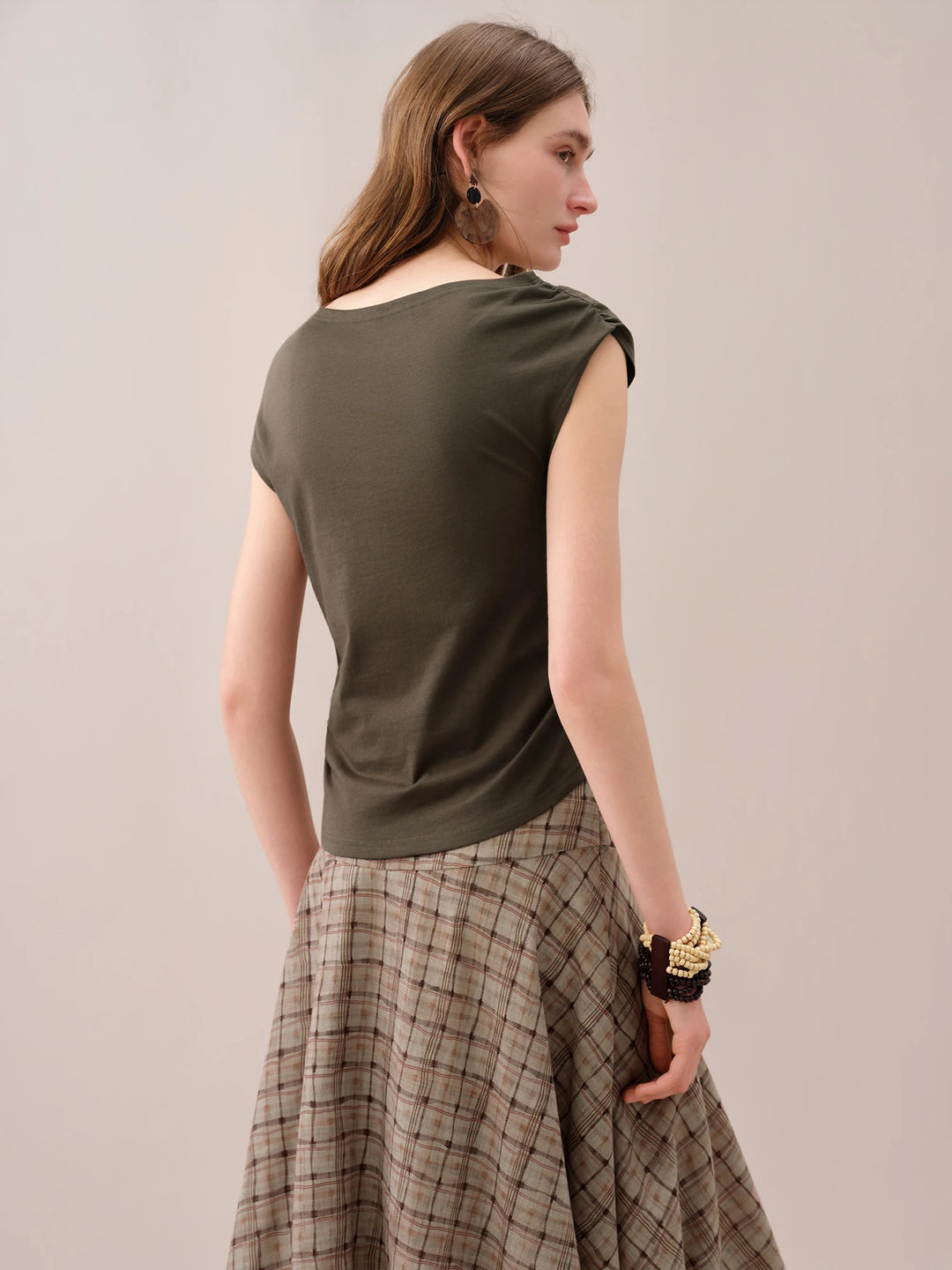 Drappina Twist-Knot Asymmetric Top