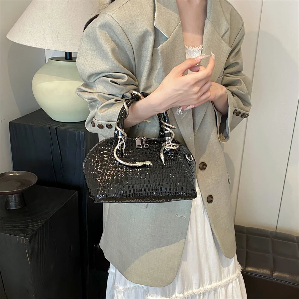 Python Crest Handbag