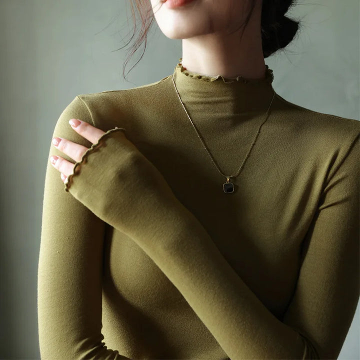 Softline Ruffle Turtleneck