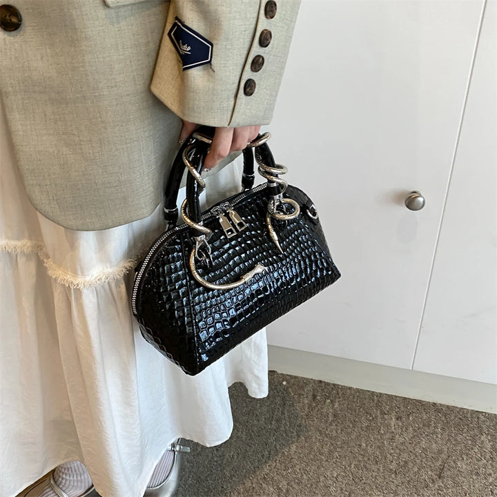 Python Crest Handbag