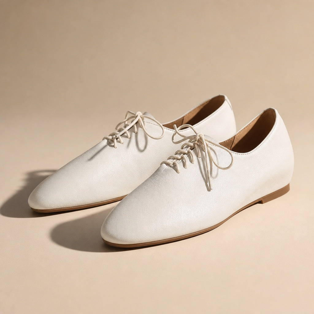 Lucca Lace-Up Oxford Flats — 08_studio_shadow_hero_angle