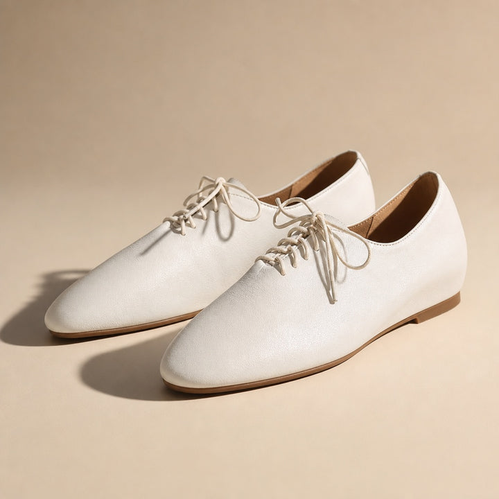 Lucca Lace-Up Oxford Flats — 08_studio_shadow_hero_angle